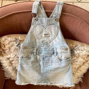 OshKosh overall denim dress.